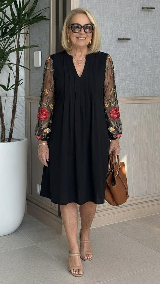 Elegantes Mini-Kleid mit V-Ausschnitt und transparenten Ärmeln