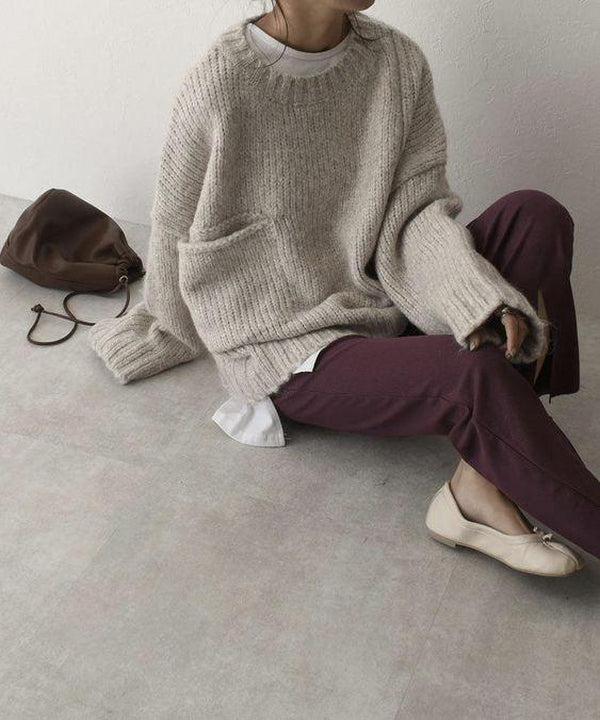 Übergroßer elfenbeinfarbener Pullover mit Vordertasche